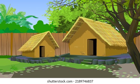 Village house landscape with mud made wall and green trees.