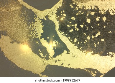 Vinatge shining abstract turquoise, green and gold marble pattern with sparkles. Vector background in alcohol ink technique with glitter. Template for banner, poster design. Fluid art painting