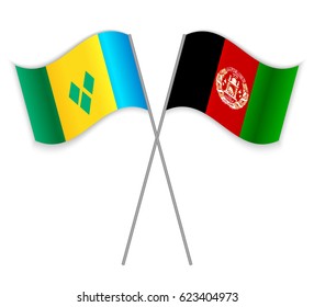 Vincentian and Afghan crossed flags. Saint Vincent and the Grenadines combined with Afghanistan isolated on white. Language learning, international business or travel concept.