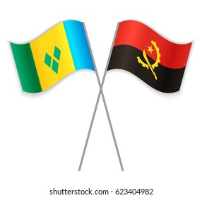 Vincentian and Angolan crossed flags. Saint Vincent and the Grenadines combined with Angola isolated on white. Language learning, international business or travel concept.