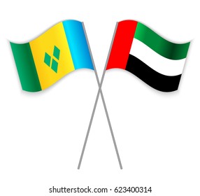 Vincentian and Emirian crossed flags. Saint Vincent and the Grenadines combined with United Arab Emirates isolated on white. Language learning, international business or travel concept.