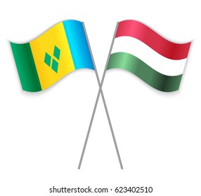 Vincentian and Hungarian crossed flags. Saint Vincent and the Grenadines combined with Hungary isolated on white. Language learning, international business or travel concept.