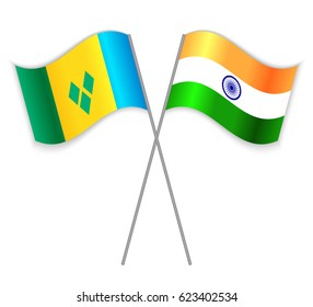 Vincentian and Indian crossed flags. Saint Vincent and the Grenadines combined with India isolated on white. Language learning, international business or travel concept.