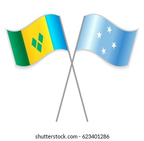 Vincentian and Micronesian crossed flags. Saint Vincent and the Grenadines combined with Micronesia isolated on white. Language learning, international business or travel concept.
