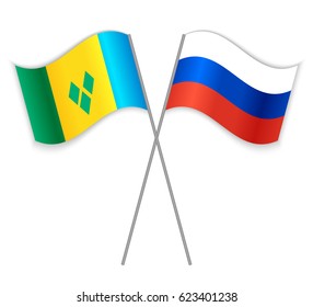 Vincentian and Russian crossed flags. Saint Vincent and the Grenadines combined with Russia isolated on white. Language learning, international business or travel concept.