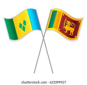 Vincentian and Sri Lankan crossed flags. Saint Vincent and the Grenadines combined with Sri Lanka isolated on white. Language learning, international business or travel concept.