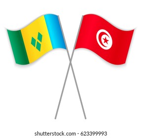 Vincentian and Tunisian crossed flags. Saint Vincent and the Grenadines combined with Tunisia isolated on white. Language learning, international business or travel concept.