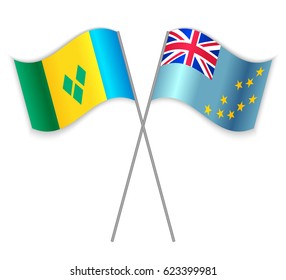 Vincentian and Tuvaluan crossed flags. Saint Vincent and the Grenadines combined with Tuvalu isolated on white. Language learning, international business or travel concept.