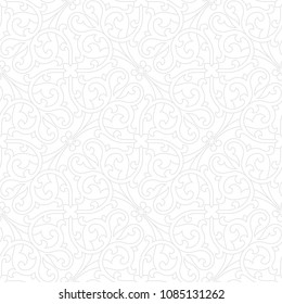 Vintage abstract floral seamless pattern. Intersecting elegant stylized leaves and scrolls forming abstract floral ornament in Arabesque style.