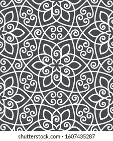 Vintage abstract floral seamless pattern. Intersecting curved elegant stylized leaves and scrolls forming abstract floral background in Arabic style. Arabesque design. Decorative lattice.