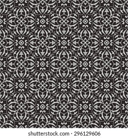 Vintage abstract floral seamless pattern with intersecting curved elegant stylized leaves and scrolls forming abstract floral ornament in Arabic style. Arabesque.