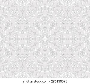 Vintage abstract floral seamless pattern. Intersecting curved elegant stylized leaves and scrolls forming abstract floral ornament in Arabic style. Arabesque.