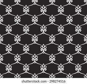 Vintage abstract floral seamless pattern. Intersecting curved elegant stylized leaves and scrolls forming abstract floral ornament in Arabic style. Arabesque. Decorative lattice.