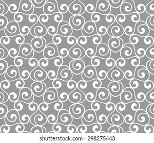 Vintage abstract floral seamless pattern with curved elegant stylized leaves and scrolls forming abstract floral ornament. Arabesque.