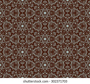 Vintage abstract floral seamless pattern. Intersecting curved elegant stylized leaves and scrolls forming abstract floral ornament in Arabic style. Arabesque.
