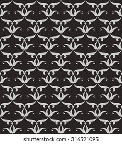 Vintage abstract floral seamless pattern. Intersecting curved elegant stylized leaves and scrolls forming abstract floral ornament in Arabic style. Arabesque.