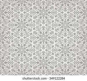 Vintage abstract floral seamless pattern. Intersecting curved elegant stylized leaves and scrolls forming abstract floral ornament in Arabic style. Arabesque.

