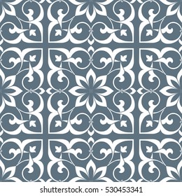 Vintage abstract floral seamless pattern. Intersecting curved elegant stylized leaves and scrolls forming abstract floral ornament in Arabic style. Arabesque.