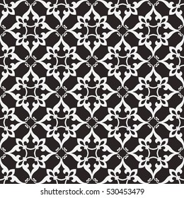 Vintage abstract floral seamless pattern. Intersecting curved elegant stylized leaves and scrolls forming abstract floral ornament in Arabic style. Arabesque.