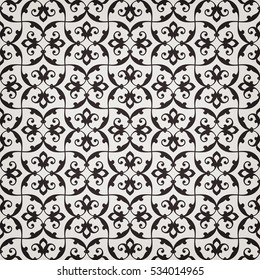Vintage abstract floral seamless pattern. Intersecting curved elegant stylized leaves and scrolls forming abstract floral ornament in Arabian style. Arabesque. Decorative lattice in Moroccan style