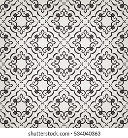 Vintage abstract floral seamless pattern. Intersecting curved elegant stylized leaves and scrolls forming abstract floral ornament in Arabian style. Arabesque. Decorative lattice.
