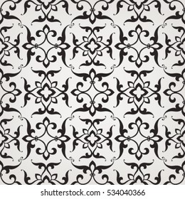 Vintage abstract floral seamless pattern. Intersecting curved elegant stylized leaves and scrolls forming abstract floral ornament in Arabian style. Arabesque