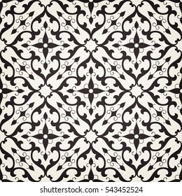 Vintage abstract floral seamless pattern. Intersecting curved elegant stylized leaves and scrolls forming abstract floral ornament in Arabic style on white background. Arabesque.
