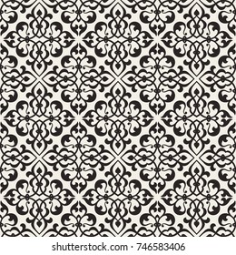 Vintage abstract floral seamless pattern. Intersecting stylized leaves, branches and scrolls forming abstract floral background in Arabic style. Arabesque design.
