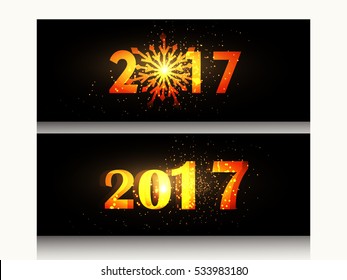 Vintage Abstract Happy New Year 2017 website header ,greeting card , banner of golden Lettering Composition And floral Burst of Golden Textured text with decoration in shiny and golden color 