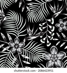 vintage abstract tropical seamless pattern with black white palm leaves and strelitzia flowers plants foliage on night background. Floral background. Exotic wallpaper. Trendy summer Hawaii print
