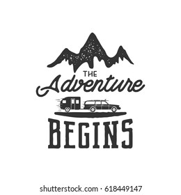 Vintage adventure Hand drawn label design. "The Adventure Begins" sign and outdoor activity symbols - mountains, rv trailer. Monochrome. Isolated on white background. Vector letterpress effect..