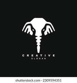 Vintage African big elephant head logo design isolated on black background