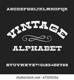 Vintage alphabet. Retro slab serif letters and numbers. Western font. Stock vector typeface for your design.