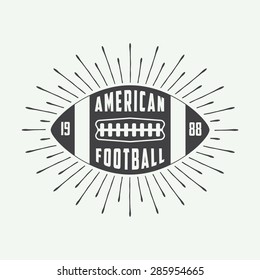 Vintage american football or rugby ball logo, badge or label. Vector illustration