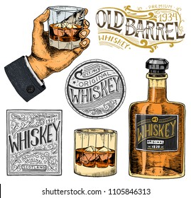 Vintage American whiskey badge. Alcoholic Label with calligraphic elements. Hand drawn engraved sketch lettering for t-shirt. Classic frame for bottle poster banner. Glass with strong drink.