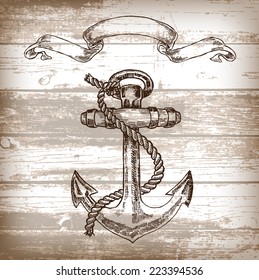 Vintage anchor on wooden background. Hand drawn vector illustration