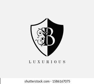 Vintage B Shield Letter Logo Icon. Black and White B With Classy Leaves Shape design perfect for fashion, Jewelry, Beauty Salon, Cosmetics, Spa, Hotel and Restaurant Logo. 