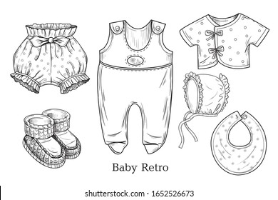
Vintage baby clothes. Engraved vector sketches. Ink drawing objects on a white background. Retro.