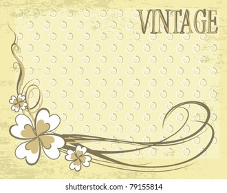 Vintage background with fabric circle pattern and flower composition