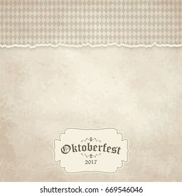 vintage background with ripped open paper have checkered pattern for Oktoberfest 2017