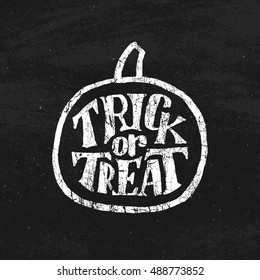 Vintage banner with white hand lettering text and pumpkin for Halloween Party on black chalkboard with cracks texture. Trick or Treat holiday tradition.