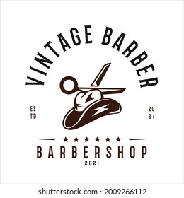 Vintage Barbershop Logo Vector Template. With Cowboy Hat and Scissor Vector Illustration