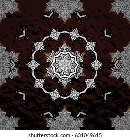 Vintage baroque floral pattern in gold over brown. Golden element on brown background. Ornate vector decoration. Luxury, royal and Victorian concept.