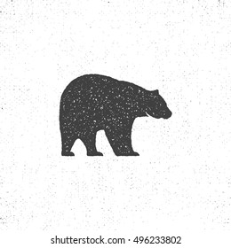 Vintage bear mascot, symbol or icon in rough silhouette style, monochrome design. Can be used for T-shirts print, labels, badges, stickers, logotypes. Vector illustration