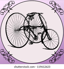 Vintage Bicycle with three wheel inside a decoration frame Retro Bicycle with three wheel on a vintage framed floral background