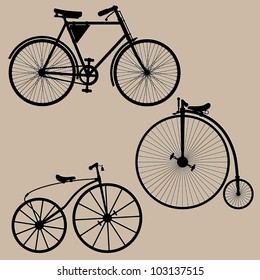 Vintage bicycles. Silhouettes of three vintage bikes. Vector illustration.