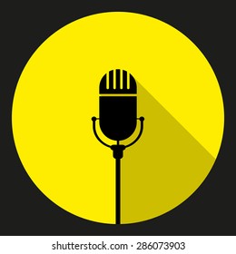 Vintage black silhouette retro stage microphone. web icon in cir
