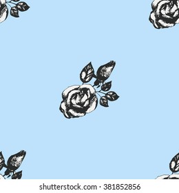 Vintage black and white roses on blue background, seamless pattern.