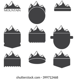Vintage blank badges with mountains. Vector illustration.