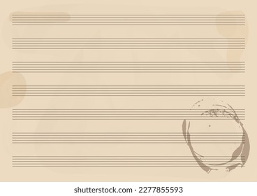 Vintage blank sheet music page with a coffe stain from a mug.